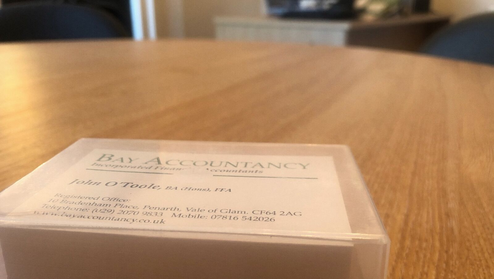 Bay Accountancy business cards on the meeting table at the Penarth office